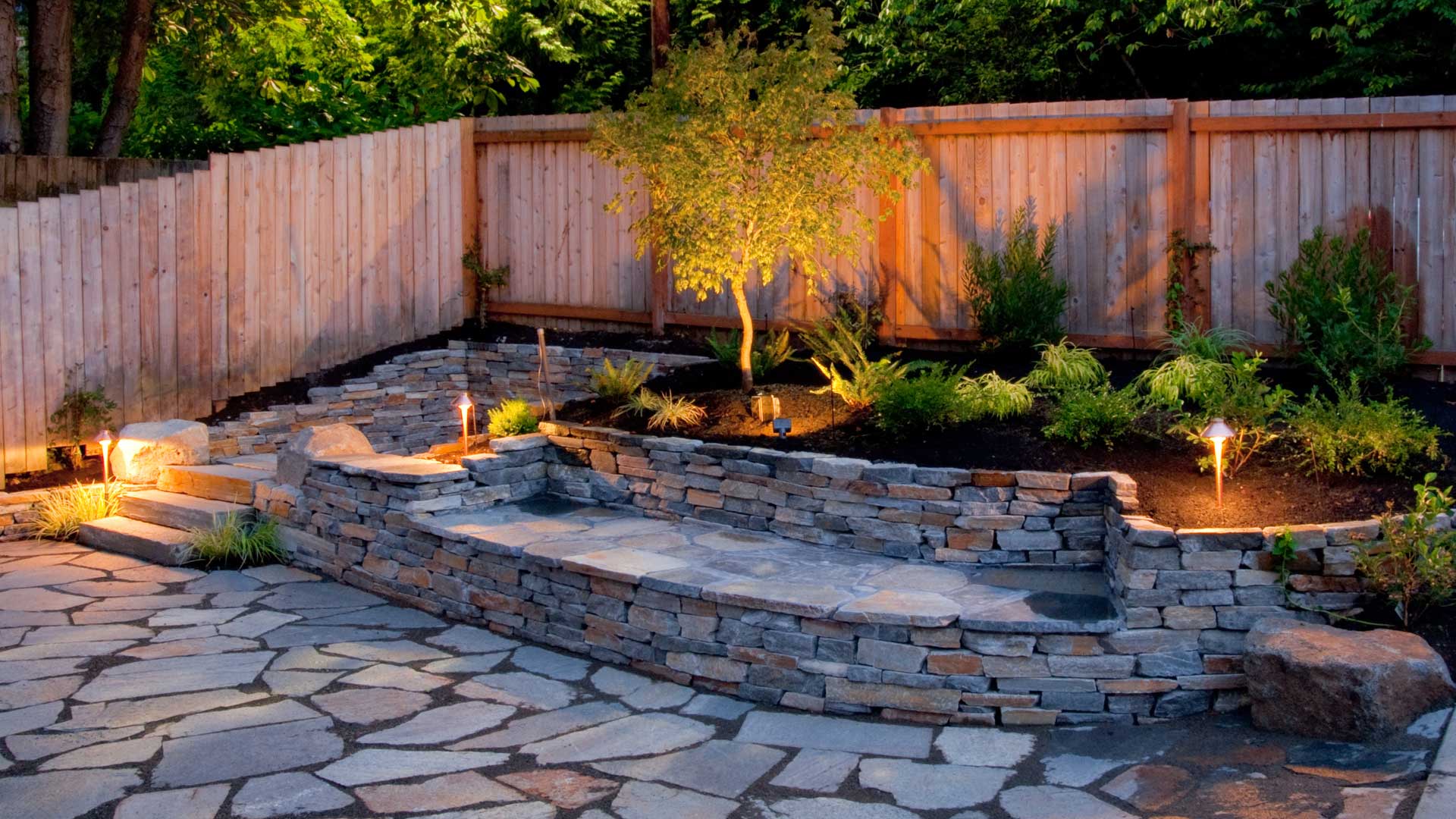Landscape lighting and pathway lighting in the backyard at a home in Knoxville, TN.